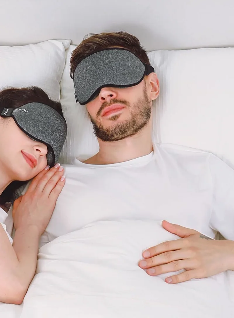A couple asleep side by side in bed, both in gray MZOO Spacious masks with a black edge.